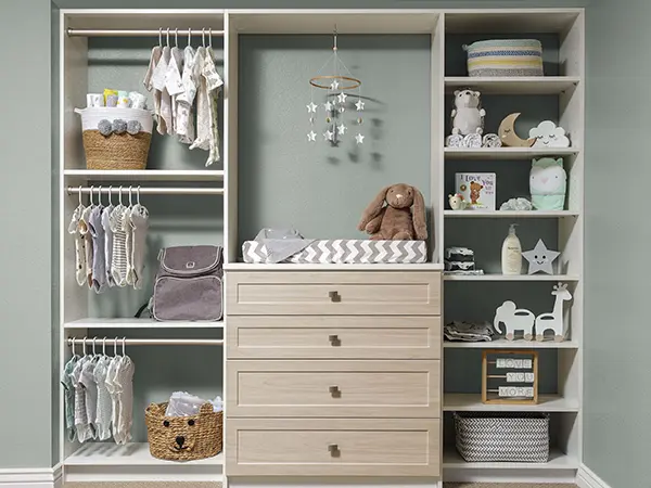 https://www.creativeclosetorganizers.com/wp-content/uploads/2022/05/White-and-Fawn-One-Piece-Shaker-Nusery-Closet-Jul-2020-scaled-1.webp