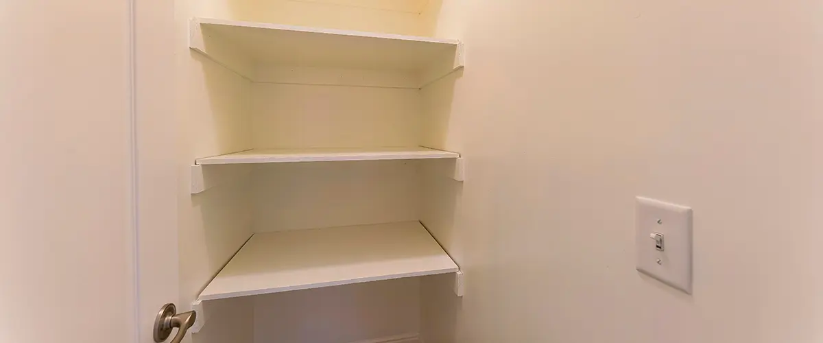 closet alcoves in a small laundry room