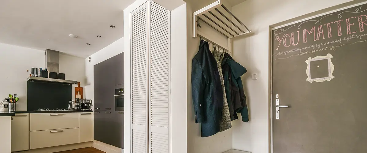 coat rack in the corner of a small entryway