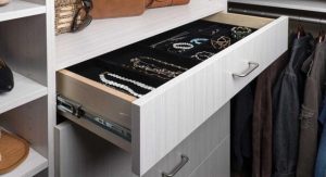Velvet-lined jewelry drawer inside closet