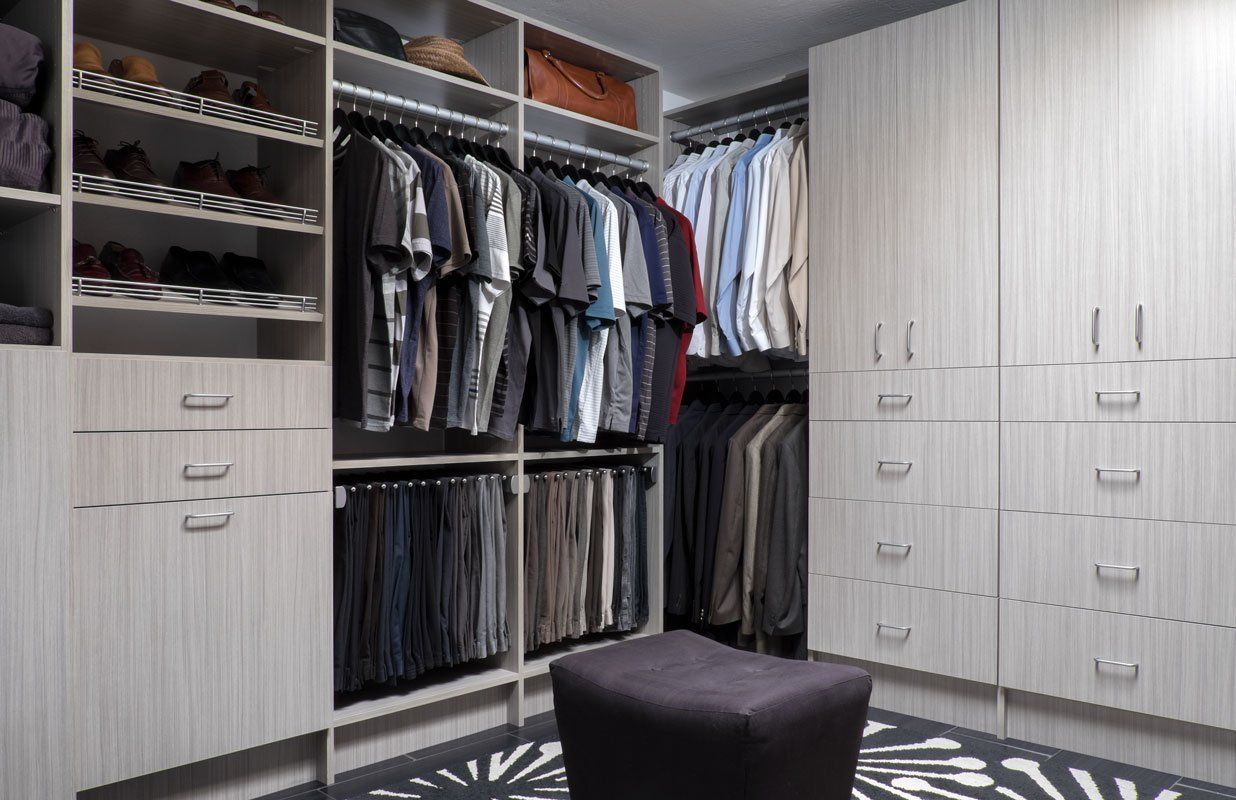 Concrete Flat Panel Walk-in Closet with Pants Racks