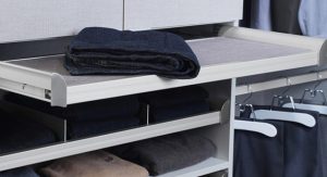Pants on folding table in closet