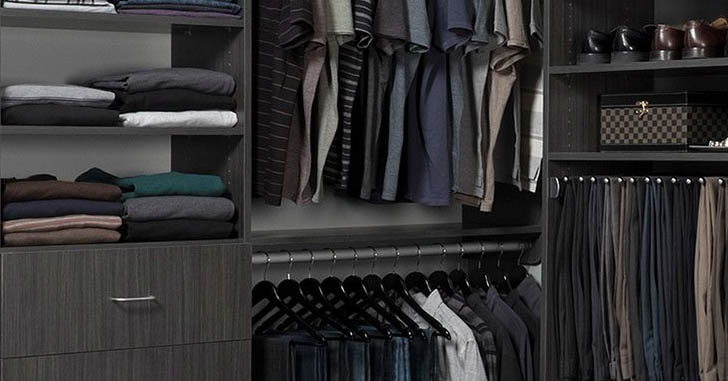 A closet with black clothes