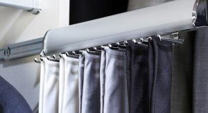 Neckties on rack in closet
