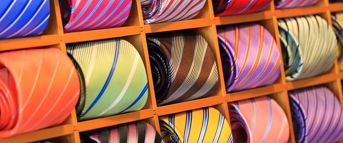 tie rack with colorful ties on display