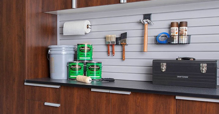 Cabinets in a garage with a workbench