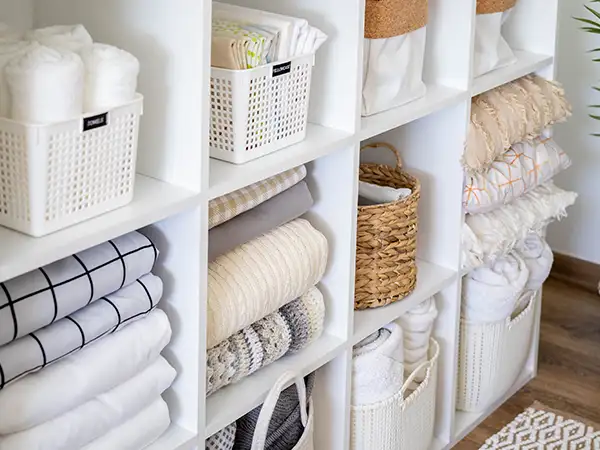 cabinet shelves with linen