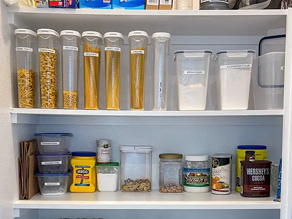 newly installed kitchen pantry close-up shot of shelves and items inside