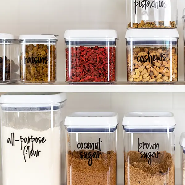 closeup of pantry shelves with kitchen jars