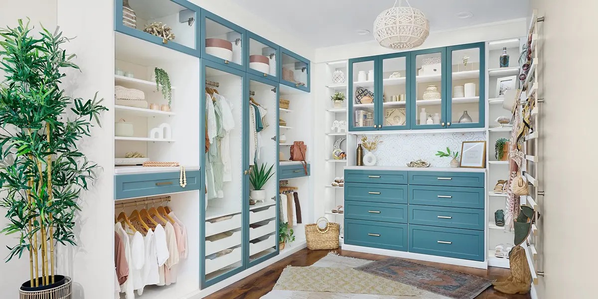 Large custom closet with blue and white cabinets