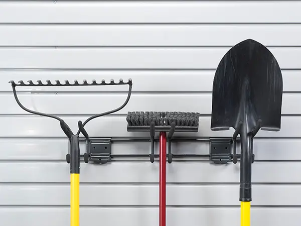 Hooks for different tools on a garage wall