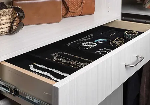 Jewelry organizers in white drawer