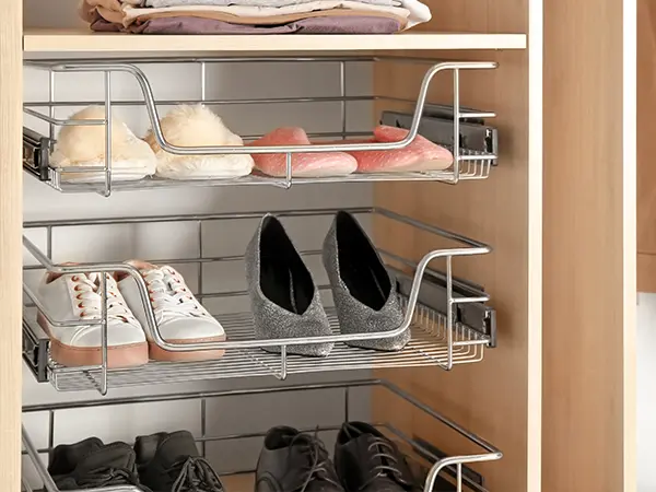 A small shoe rack in a closet