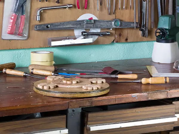 A wood workbench in a garage