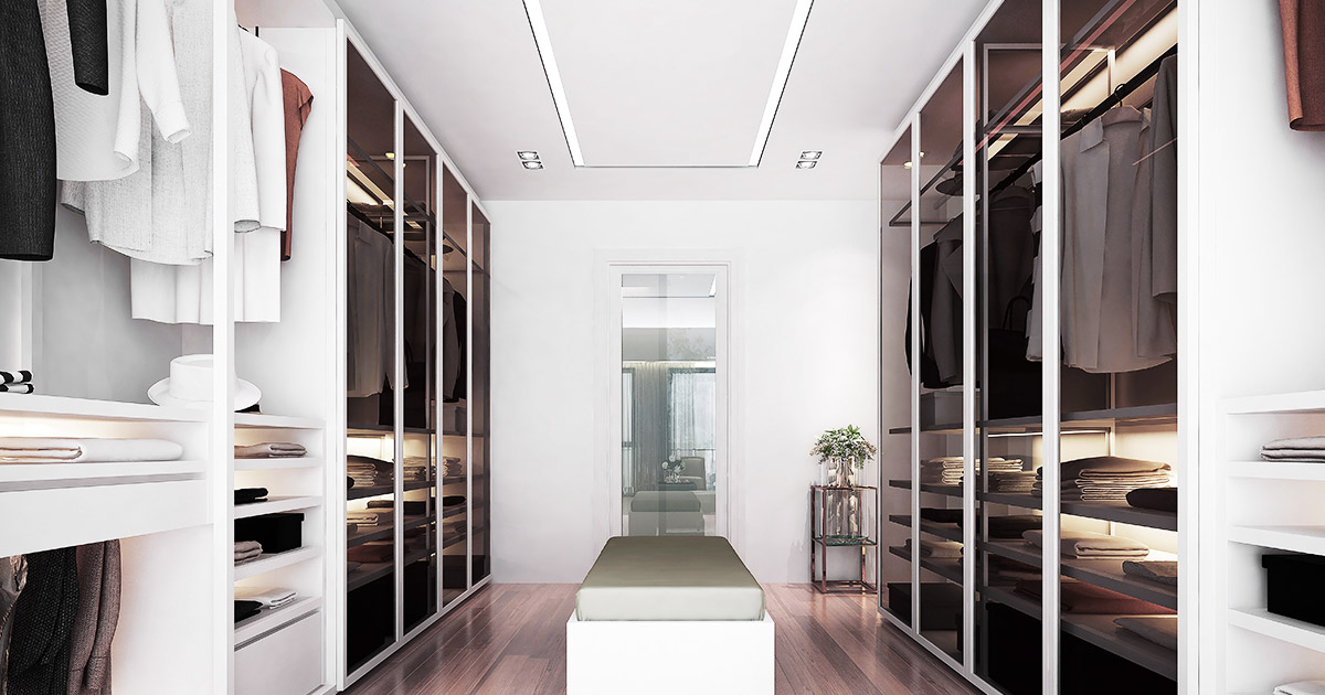 Modern style walk in closet room with white island