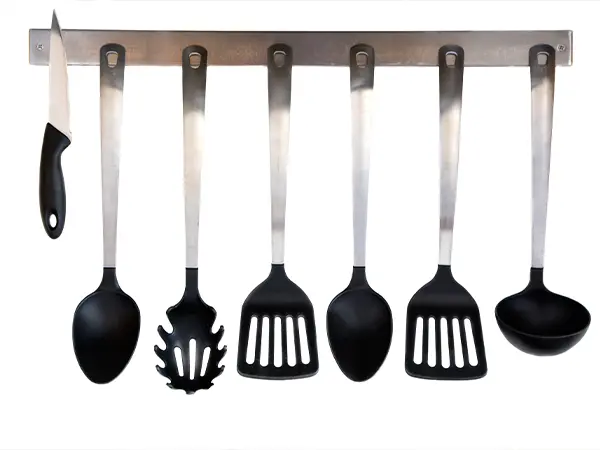 Stainless steel utensil rack with hooks for hanging kitchen tools in small space