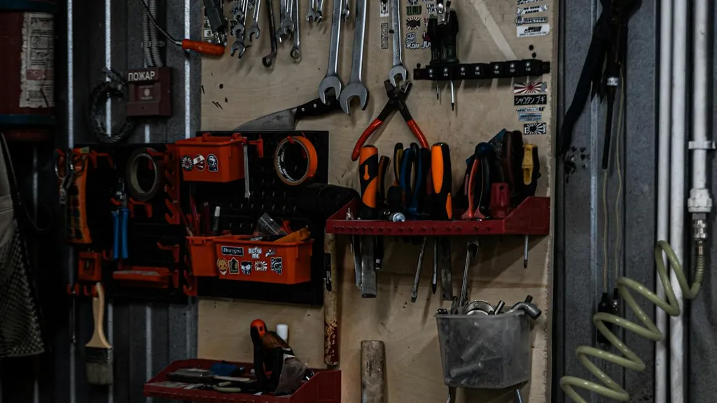 Organized garage with custom cabinets and wall-mounted storage tools